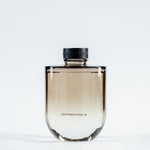 Allure Black Oudh and Patchouli 400ml reed diffuser bottle close-up on white background