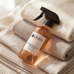 LEAFI Aroma Champagne Toast luxury room spray 200ml resting on stacked soft neutral towels