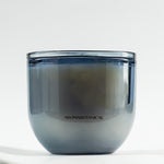 LEAFI Allure Cotton Blossom & Lily candle (400g) in an amber glass jar on a white background.